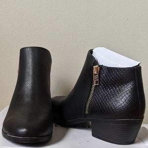 Black booties with gold zipper